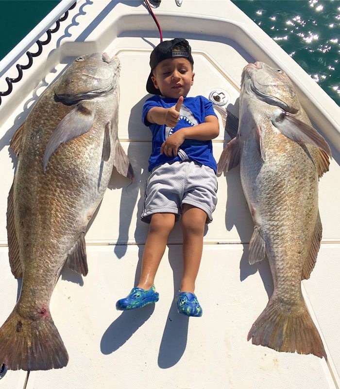 Boy with fish at the River Fishing Charter in Cocoa Beach