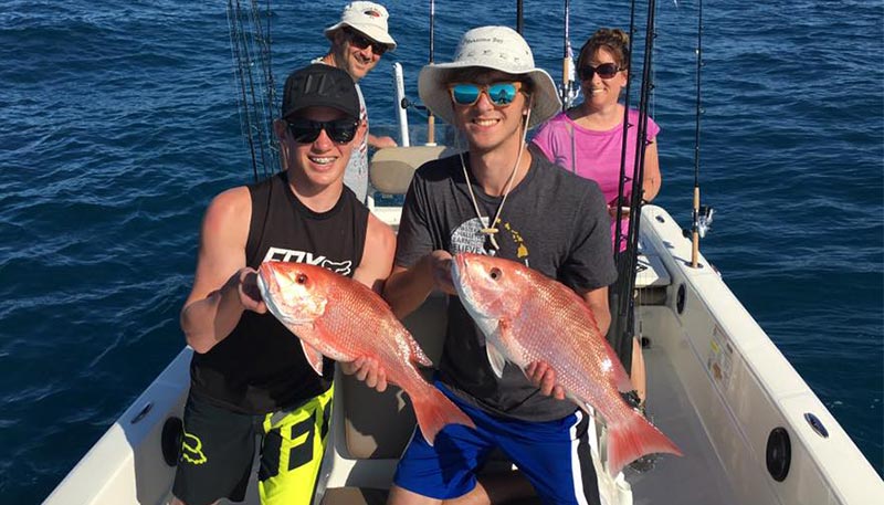 Boys with Red Snapper at the Red Snapper Fishing Charter in Cocoa Beach