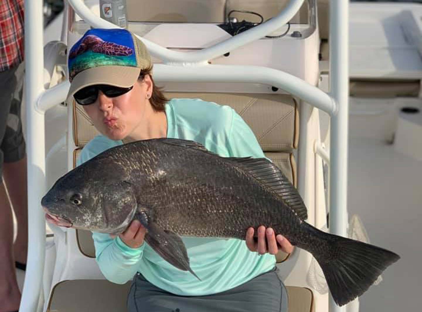 Woman caught fish on Daytona Beach Deep Sea Fishing trip