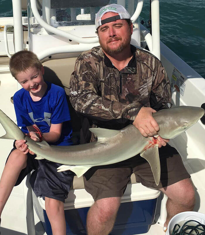 Father and son at the Shark Fishing Charter in Cape Canaveral