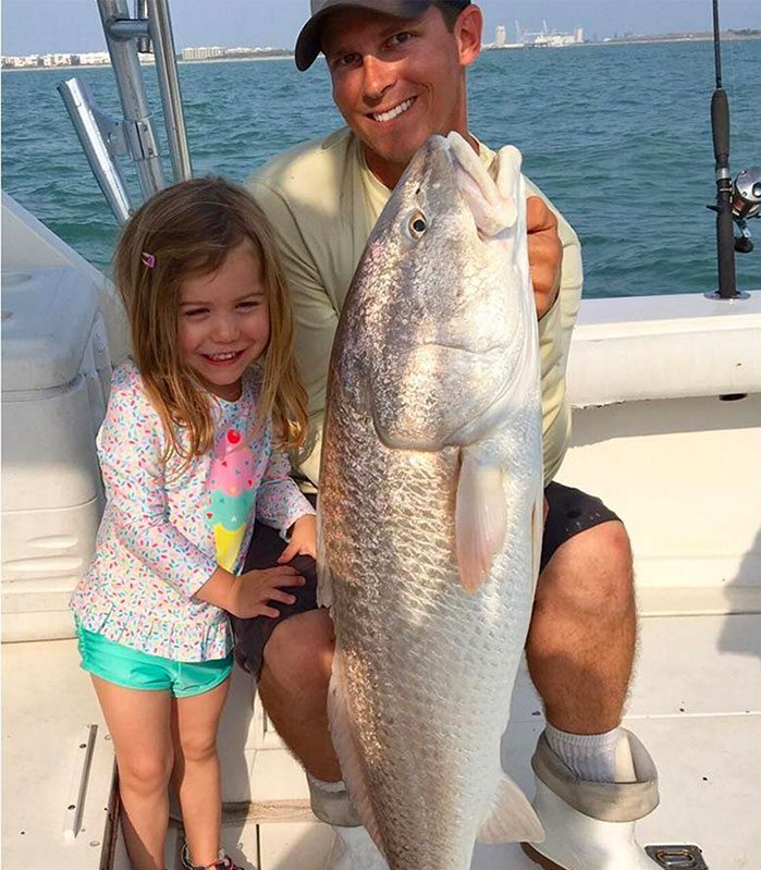 Father and daughter caught redfish at the Inshore Fishing Charter in Cape Canaveral