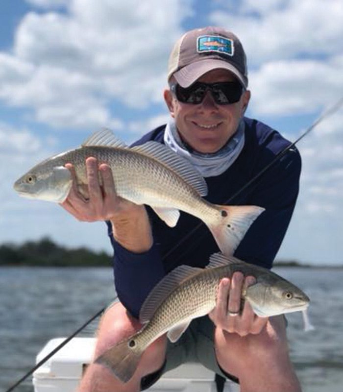 Two redfish caught on the Bay Fishing Charter in Cape Canaveral and Titusville