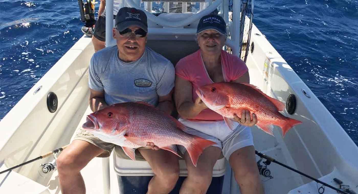 Couple on a red snapper fishing charter out of Cape Canaveral