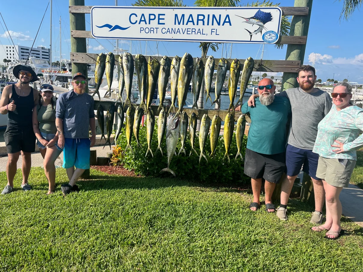 Charter group at Cape Marina in Port Canaveral with a full rack of mahi from an offshore Fin & Fly trip