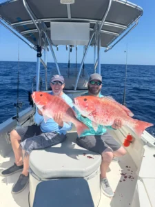 Anglers holding large red snapper offshore during the South Atlantic red snapper season closure